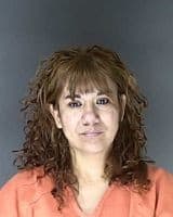 A booking photo of Gloria Ramos Pena.