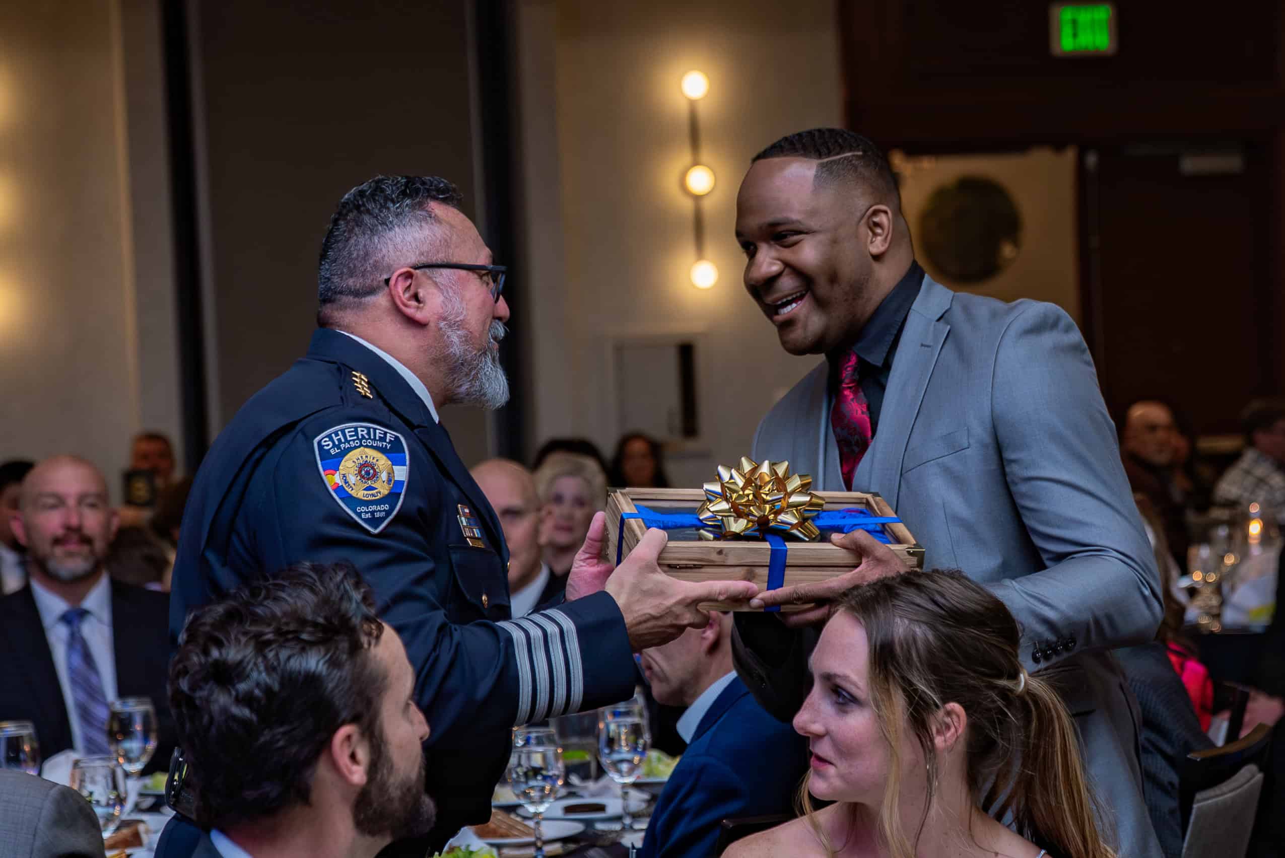 Sheriff shaking hands with Sergeant